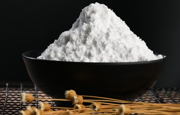 white powder on black bowl